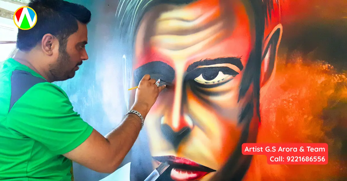 Artist G.S. Arora painting fine details on a pop culture wall mural